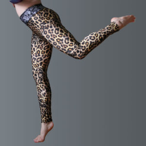 Leopard and skull printed high waisted leggings on a woman's body