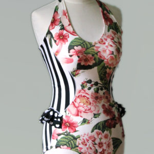 A floral and striped leotard on a mannequin